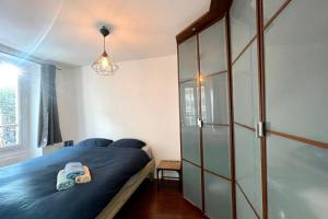 Postel nebo postele na pokoji v ubytování 35 min from Paris - Saint Maurice - Chez Nolan + 6 fotografií