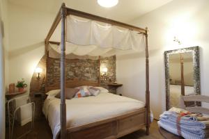 Ένα ή περισσότερα κρεβάτια σε δωμάτιο στο Agriturismo Gualdo Del Re +79 φωτογραφίες
