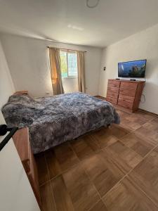 Giường trong phòng chung tại Los viejos Potrero de Garay +1 ảnh