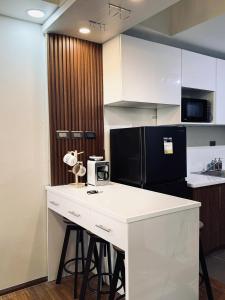 Η κουζίνα ή μικρή κουζίνα στο Splendido Taal by Oak & Ember