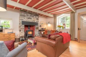 TV a/nebo společenská místnost v ubytování Neuadd-Dolwyddelan