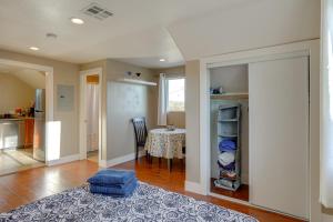 a room with a table and a dining room at 5 Mi to Jack London Square Apt with Shared Yard in Alameda