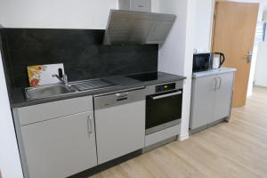 Kuchyň nebo kuchyňský kout v ubytování Ferienwohnung Wendel