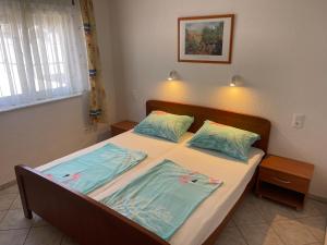 Postel nebo postele na pokoji v ubytování Apartements Delfin Vir