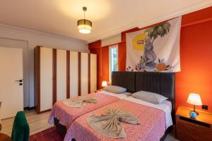 Ένα ή περισσότερα κρεβάτια σε δωμάτιο στο Melissas Suites Lara +103 φωτογραφίες