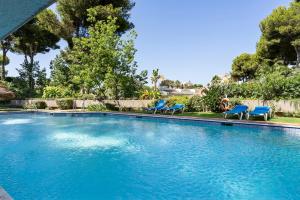 Bazén v ubytování Modern apartment near the beach in Riviera del Sol nebo v jeho okolí