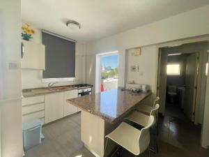 Kuchyň nebo kuchyňský kout v ubytování Christina Apartment