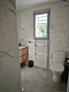 Koupelna v ubytování La Villa Céleste Havre de Luxe