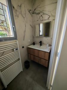 Koupelna v ubytování La Villa Céleste Havre de Luxe