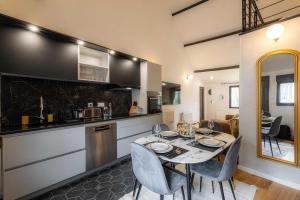 Η κουζίνα ή μικρή κουζίνα στο Appart cosy avec Spa - Liziec