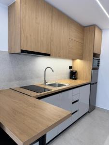 Η κουζίνα ή μικρή κουζίνα στο Academia Suites