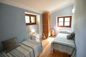 Ένα ή περισσότερα κρεβάτια σε δωμάτιο στο Historic Farmhouse In The Tuscan Hills +12 φωτογραφίες