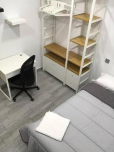 Ένα ή περισσότερα κρεβάτια σε δωμάτιο στο Check-in 24H PLAZA ESPAÑA AMPLIO Centro planta 4