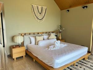 Ένα ή περισσότερα κρεβάτια σε δωμάτιο στο 苏梅岛观景台海景别墅Golden Coconut Villa7 +46 φωτογραφίες