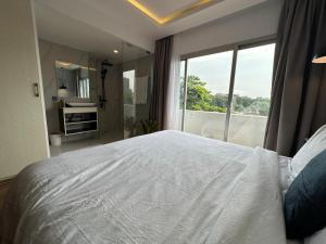 Ліжко або ліжка в номері Bark Luxury Appartments au Plateau Abidjan