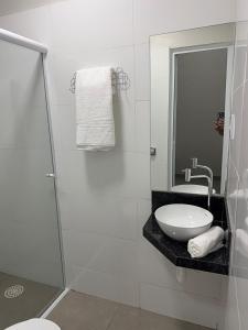 Et badeværelse på WEL Home - Suítes - Próximo ao HC UFU