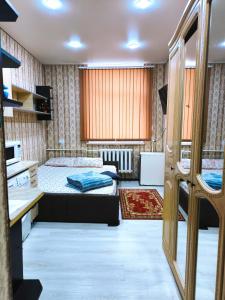 Postel nebo postele na pokoji v ubytování Parcul Ștefan cel mare și sfânt