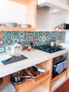 Kuchyň nebo kuchyňský kout v ubytování Monte Meu