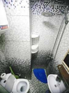 Koupelna v ubytování Parcul Ștefan cel mare și sfânt