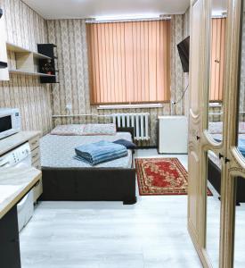 Postel nebo postele na pokoji v ubytování Parcul Ștefan cel mare și sfânt