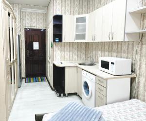 Kuchyň nebo kuchyňský kout v ubytování Parcul Ștefan cel mare și sfânt