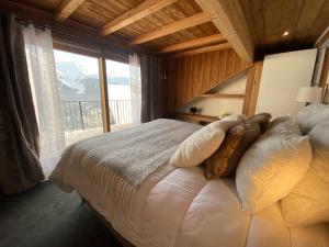 Ένα ή περισσότερα κρεβάτια σε δωμάτιο στο Le 1850 Lodge +89 φωτογραφίες