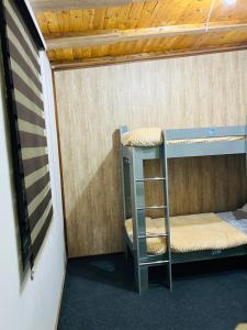 Ένα ή περισσότερα κρεβάτια σε δωμάτιο στο Baku hostel