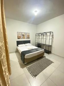 Ένα ή περισσότερα κρεβάτια σε δωμάτιο στο Apê moderno e aconchegante!