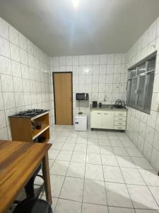 Η κουζίνα ή μικρή κουζίνα στο Apê moderno e aconchegante!