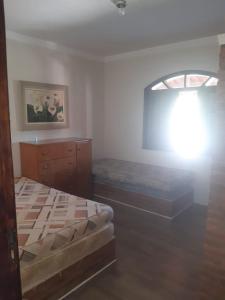 Postel nebo postele na pokoji v ubytování Chácara dos sonhos + 30 fotografií