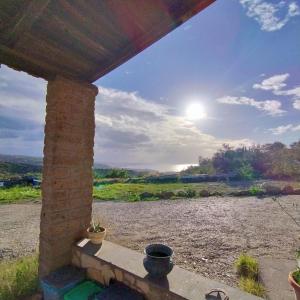 a view from the porch of a house at Karma Rural Buenavista in Santa Marinella