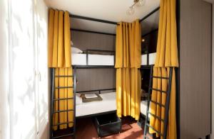 Postel nebo postele na pokoji v ubytování Hostel kiwach marra