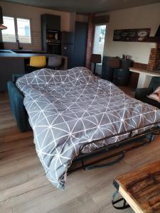 Ένα ή περισσότερα κρεβάτια σε δωμάτιο στο Graon de bonheur