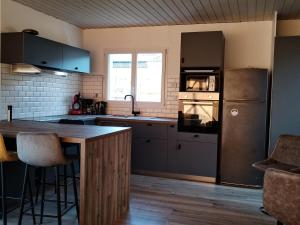 Η κουζίνα ή μικρή κουζίνα στο Graon de bonheur