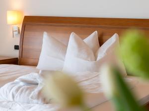 Postel nebo postele na pokoji v ubytování Hotel Blitzburg
