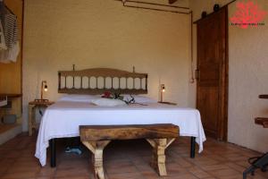 Katil atau katil-katil dalam bilik di Coral Riviera Sardinia villa & cottage