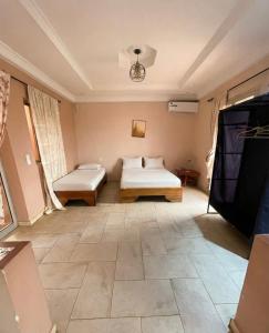 Postel nebo postele na pokoji v ubytování Studio à Saint Louis