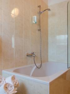 Koupelna v ubytování Hotel Blitzburg