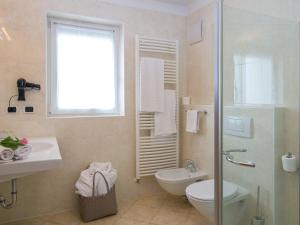 Koupelna v ubytování Hotel Blitzburg