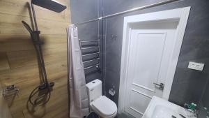 Koupelna v ubytování Imran Hotel Navoiy