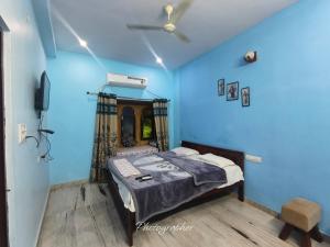 Postel nebo postele na pokoji v ubytování fort view palace