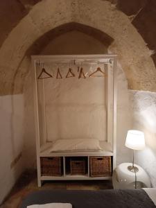 Voodi või voodid majutusasutuse In Via Rosario - Ipogeo Holiday Home toas