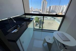 Khu vực ghế ngồi tại Excelente apartamento a 3 quadras da praia +11 ảnh