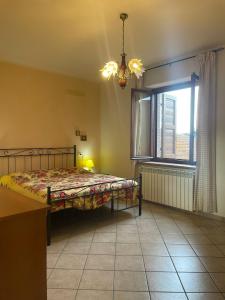 Ένα ή περισσότερα κρεβάτια σε δωμάτιο στο Agriturismo Da Quei Citti +21 φωτογραφίες