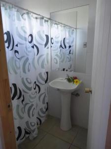 Koupelna v ubytování Cabañas Refugio Arqueologico