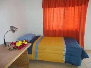 Postel nebo postele na pokoji v ubytování Cabañas Refugio Arqueologico