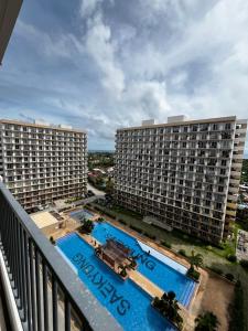an aerial view of two large buildings and a pool at Cel Escapia in Lapu Lapu City