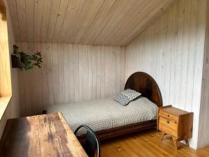 Ένα ή περισσότερα κρεβάτια σε δωμάτιο στο House with marvelous view in Frutillar