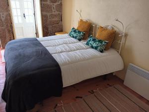 Giường trong phòng chung tại Casa da Fonte