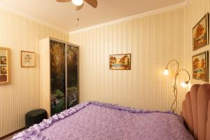 Ένα ή περισσότερα κρεβάτια σε δωμάτιο στο Apartments Amber Riga